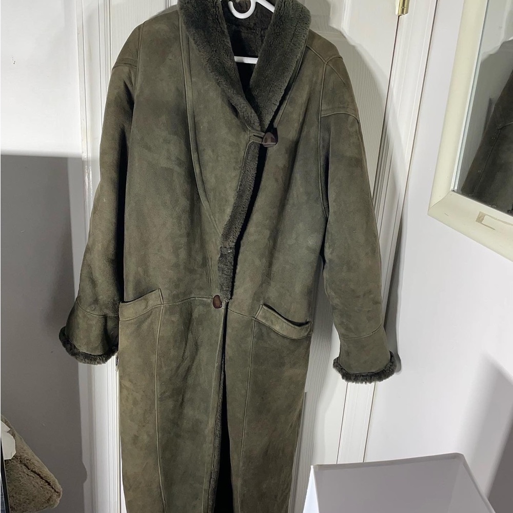 Women’s seafoam green Sherling full length coat.